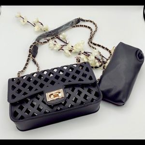 Purse includes coin wallet. With multiple lengths of wear.